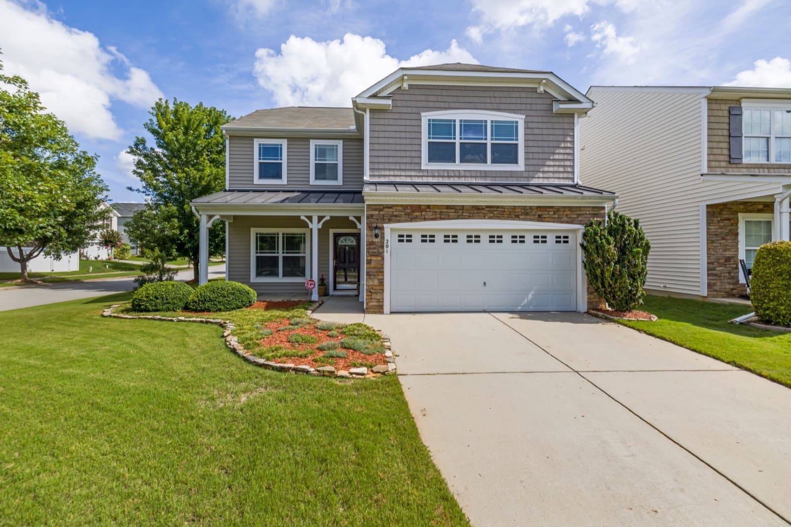 HVAC service in Holly Springs, North Carolina: North Carolina home with landscaped yard